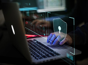 Hacker working on computer