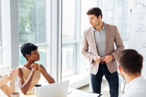 Young businesspeople having a meeting at the office